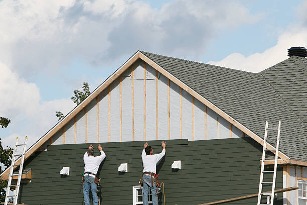 Professional Vinyl Siding technician working in Morral, OH